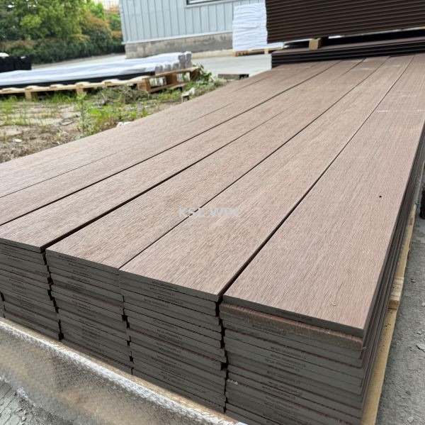 Professional installation of co-extruded WPC deck boards with stainless steel clips