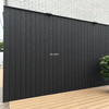 Outdoor Courtyard Cladding Application with Black 3-Flute Horizontal WPC Siding and Decking