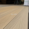 Full capped co-extruded composite decking installed in seaside resort pool area salt water resistant