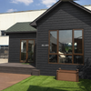 Outdoor Garden Courtyard Wall Siding Replacement with Black Charred WPC Cladding and Composite Decking