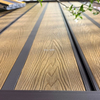 Co-extruded WPC decking outdoor patio installation, fade resistant capped composite deck boards