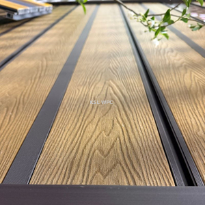 Co-extruded WPC decking outdoor patio installation, fade resistant capped composite deck boards