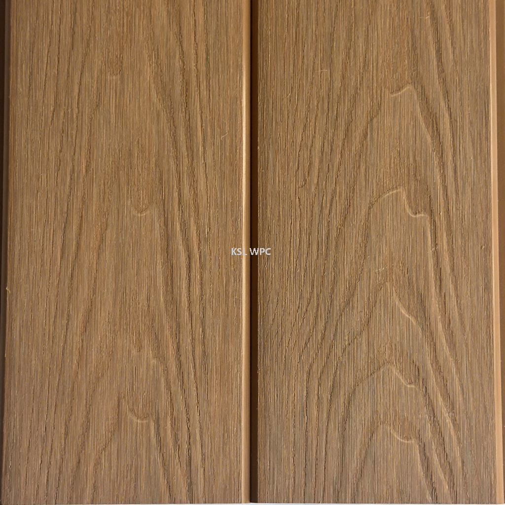 Deep embossed wood grain texture on composite wall panel