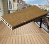 China factory co-extruded WPC decking, waterproof anti-slip UV resistant. 20+ colors, custom size OEM. Bulk wholesale price, free sample available. Get quote now.